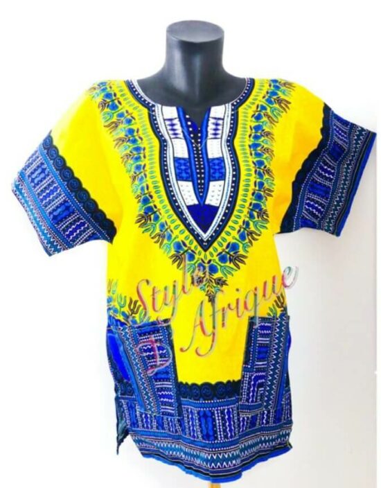 Blouse africaine DASHIKI Très jolie  blouse africaine DASHIKI  mixte. Convient à homme comme femme. Le motif 100% Ethiopien le rend unique et original. Deux poches présentes sur les cotés. Taille : L Composition: 100% Coton Couleur : Jaune et bleu ENTRETIEN : Le tissu WAX se lave à basse température (entre 30 et 40°) . Le nettoyage à la main est à privilégier. Nos tissus sont 100% COTON pour les tissus WAX, KENTE, BOGOLAN. Certains tissus plus communs peuvent être mélangés (polaire, doudou, minky, polyester, lycra; soie, ect...); dans ce cas la composition de l'article mentionnera la présence du tissu. haut vêtement femme wax africain tissu ankara. haut wax femme moderne crop top wax haut africain femme haut wax moderne vêtements wax femme tunique wax femme blouse wax femme chemise wax femme