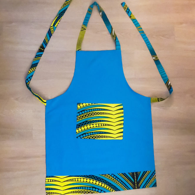 tablier de cuisine en tissu africain wax ou bogolan pour ménage et cooking. Tenue de travail et de divertissement.